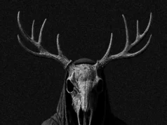Book Blackout: Ritual Now – London Dungeon’s Limited-Time Horror Event Dark hooded figure wearing a deer skull mask with large antlers against a black background.