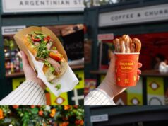 Global Cargo Eats Returns to Alton Towers for Summer 2026 Hand holding a baguette sandwich filled with greens and meat outdoors at a market stall