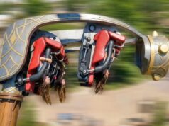 ROTOR Opening 31st July 2026 at Crealy Theme Park & Resort Suspended amusement-park ride with red-seat cars rotating on a large mechanical arm shaped like a fantasy creature.