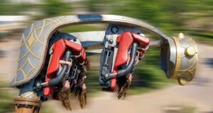 ROTOR Opening 31st July 2026 at Crealy Theme Park & Resort Suspended amusement-park ride with red-seat cars rotating on a large mechanical arm shaped like a fantasy creature.