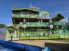 Dreamland Margate Welcomes Bavarian-Themed Funhouse to its 2026 Summer Ride Line-Up Colorful, multi-level carnival fun house with Bavarian-themed signage and decorative hearts, set on a trailer.