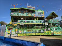 Dreamland Margate Welcomes Bavarian-Themed Funhouse to its 2026 Summer Ride Line-Up Colorful, multi-level carnival fun house with Bavarian-themed signage and decorative hearts, set on a trailer.
